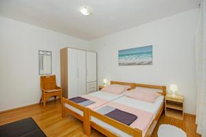 Postelja oz. postelje v sobi nastanitve Apartments Silva
