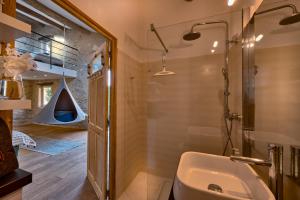 a bathroom with a sink and a shower at Maison Lou Roucas in Cabrières-dʼAigues +50 photos