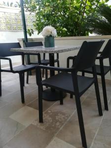 Patio nebo venkovní prostory v ubytování Apartmani Vidoš