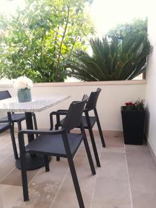 Patio nebo venkovní prostory v ubytování Apartmani Vidoš