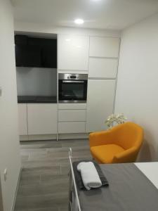 Kuchyň nebo kuchyňský kout v ubytování Apartmani Vidoš