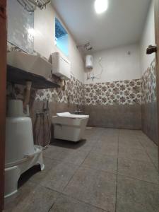 Vannituba majutusasutuses Hotel Neelkamal