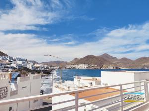 a view of the water from the balcony of a building at LA CALILLA II in San José