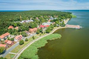 an aerial view of a small island in the water at Vila MAY in Juodkrantė
