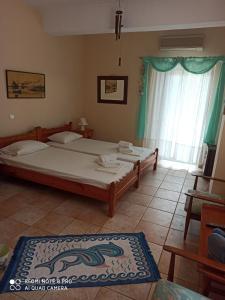 Postel nebo postele na pokoji v ubytování Mandola Del Mare