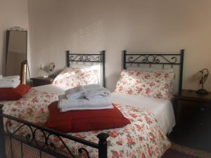 En eller flere senge i et værelse på B&B La Vittoria