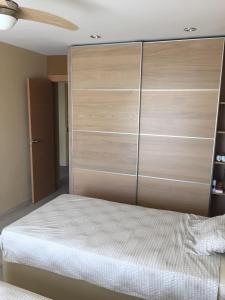 Postel nebo postele na pokoji v ubytování Apartamento Vista Mar + 2 fotografie