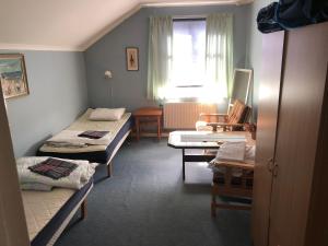 Postel nebo postele na pokoji v ubytování Älvtomt + 3 fotografie