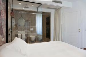 Llit o llits en una habitació de Il Caruggio Rooms&Breakfast