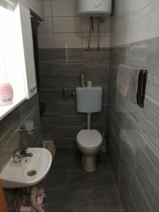 Koupelna v ubytování Apartments Ivo
