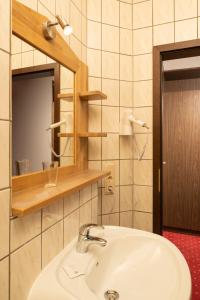 Vonios kambarys apgyvendinimo įstaigoje Hotel Restaurant Häsfeld