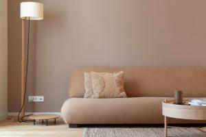 A seating area at DestinationBCN Universitat Apartments