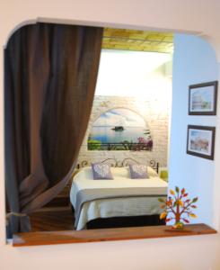 Ein Bett oder Betten in einem Zimmer der Unterkunft La Piccola Stellina