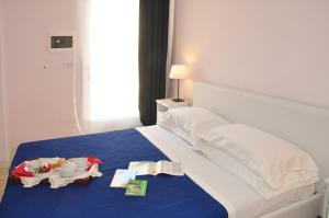 Postel nebo postele na pokoji v ubytování B&B Marebello