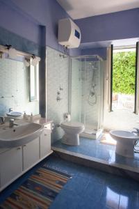 Ванная комната в Appartamenti "Elegante & Romantico"