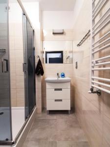 Ένα μπάνιο στο Apartament Dominikana