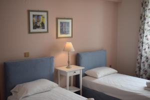 Postel nebo postele na pokoji v ubytování Eleonora apartment no2