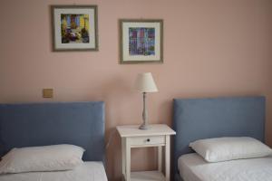 Postel nebo postele na pokoji v ubytování Eleonora apartment no2