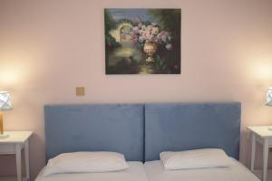 Postel nebo postele na pokoji v ubytování Eleonora apartment no2