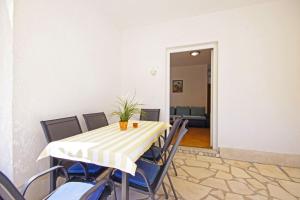 Predel za sedenje v nastanitvi Apartments Silva