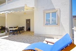 Predel za sedenje v nastanitvi Apartments Silva