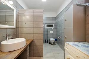Kúpeľňa v ubytovaní Apartments Silva