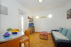 TV in/ali zabaviščno središče v nastanitvi Apartments Silva