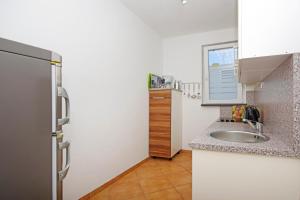 Kuhinja oz. manjša kuhinja v nastanitvi Apartments Silva