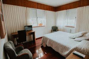 Łóżko lub łóżka w pokoju w obiekcie Hotel A Veiga