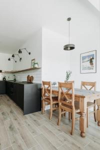 Posedenie v ubytovaní Apartament JODEŁKA