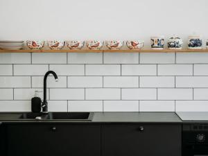 Kuchyňa alebo kuchynka v ubytovaní Apartament JODEŁKA + 37 fotografií