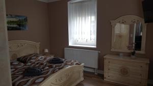 Postel nebo postele na pokoji v ubytování Ferienwohnung im Dreiländereck