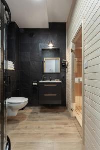 Kúpeľňa v ubytovaní Apartament JODEŁKA