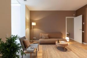 A seating area at DestinationBCN Universitat Apartments