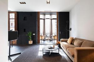 A seating area at DestinationBCN Universitat Apartments