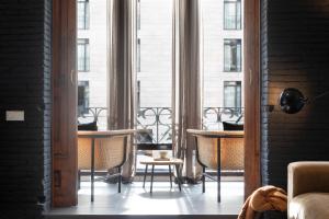 A seating area at DestinationBCN Universitat Apartments