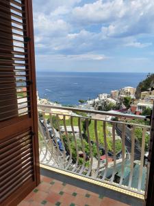a view of the ocean from a balcony at Villa Celentano in Positano