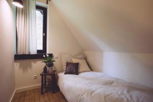 Postel nebo postele na pokoji v ubytování EDELFUCHS-LODGE