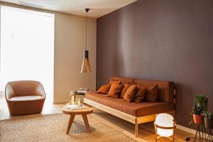 A seating area at DestinationBCN Universitat Apartments