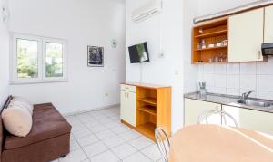 Kuchyň nebo kuchyňský kout v ubytování AGA beach suites