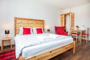 Posteľ alebo postele v izbe v ubytovaní Apartmány Nevädza