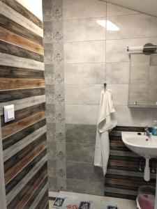 A bathroom at PODHÁJSKA 110 Még 37 kép