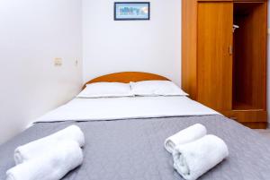 Posteľ alebo postele v izbe v ubytovaní AGA beach suites