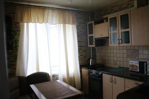 Η κουζίνα ή μικρή κουζίνα στο Апартаменти на Космонавтів
