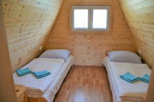 Posteľ alebo postele v izbe v ubytovaní Resort Erich