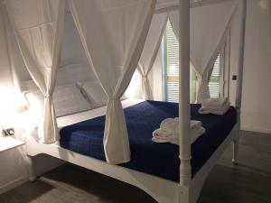Ліжко або ліжка в номері Le Sirene