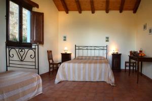 A bed or beds in a room at Villa Rica Még 37 kép