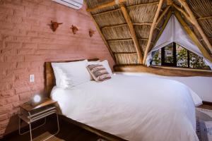 Cama o camas de una habitación en Selina Sayulita