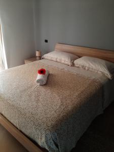 Posteľ alebo postele v izbe v ubytovaní B&B CASA MARTINA