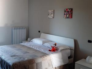 Posteľ alebo postele v izbe v ubytovaní B&B CASA MARTINA